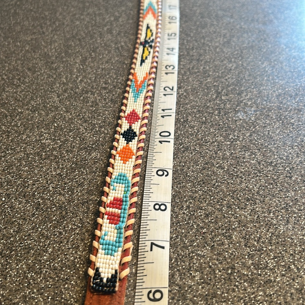Leather belt with Indian motif beading. Small